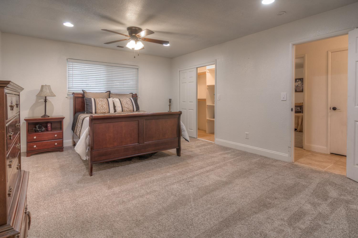 7535 Baldwin Street Valley Springs, CA 95252 - Photo 19 of 35 Large primary bedroom.
