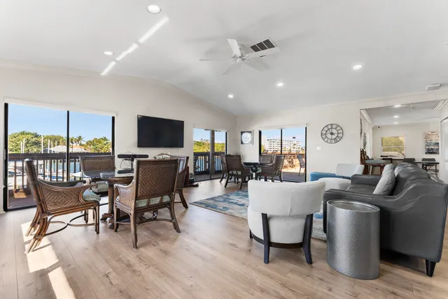 a bedroom with a large bed and dresser