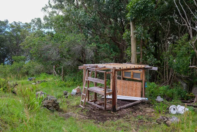 an outdoor view of a house with a yard
