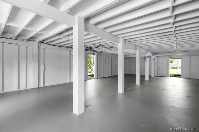 a view of a livingroom with wooden floor
