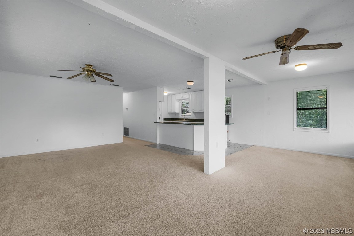 486 Detroit Terrace DeBary, FL 32713 - Photo 16 of 47 a view of a kitchen with a sink and windows
