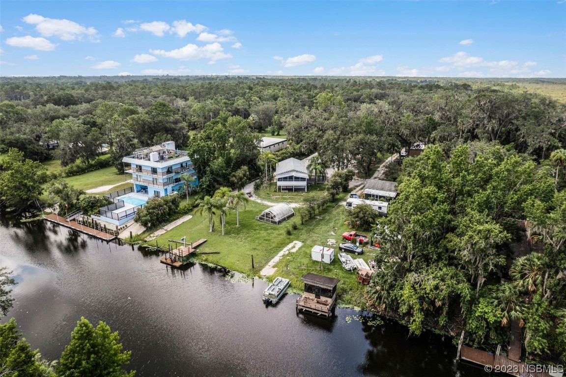 486 Detroit Terrace DeBary, FL 32713 - Photo 31 of 47 an aerial view of a house with a lake view