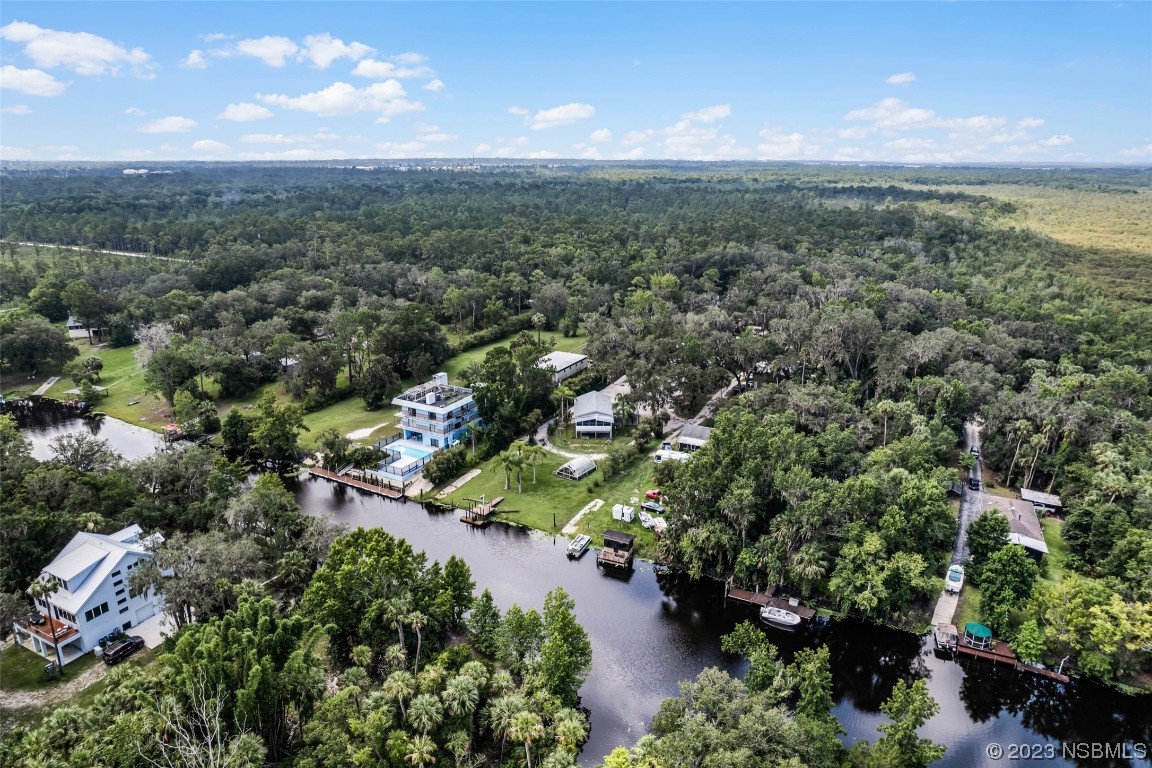 486 Detroit Terrace DeBary, FL 32713 - Photo 32 of 47 an aerial view of residential houses with outdoor space and trees