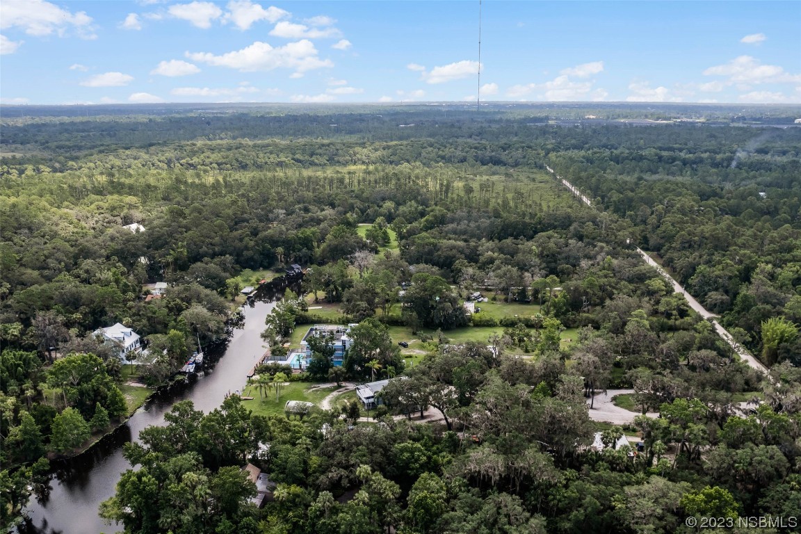 486 Detroit Terrace DeBary, FL 32713 - Photo 33 of 47 an aerial view of residential houses with outdoor space and trees