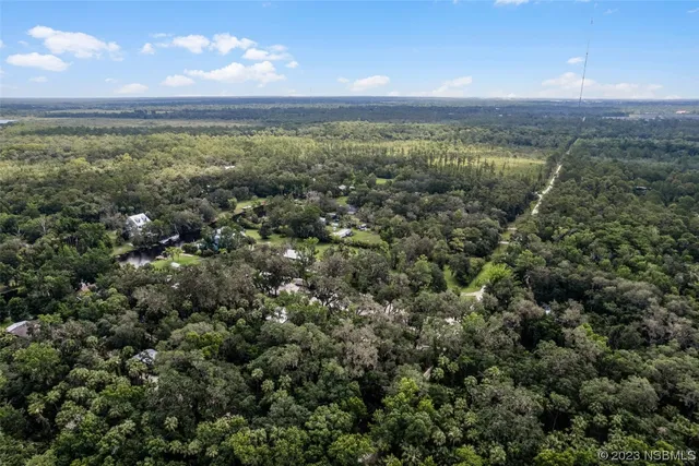 an aerial view of residential building and city view