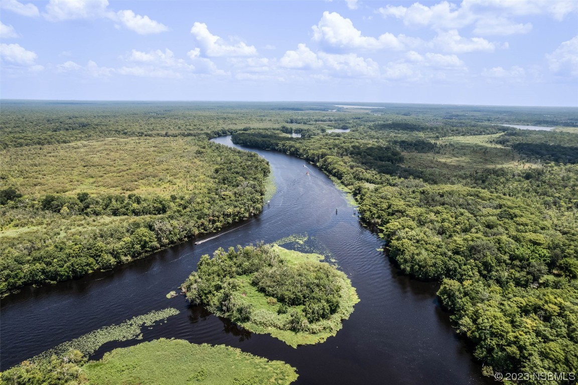 486 Detroit Terrace DeBary, FL 32713 - Photo 39 of 47 a view of a lake with a yard