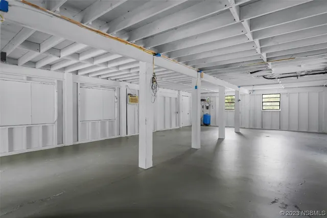 a view of a room with wooden walls