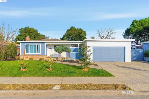 front view of house with a yard