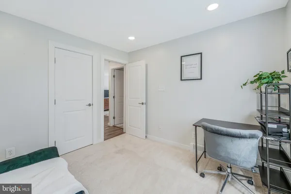 a livingroom with a workspace