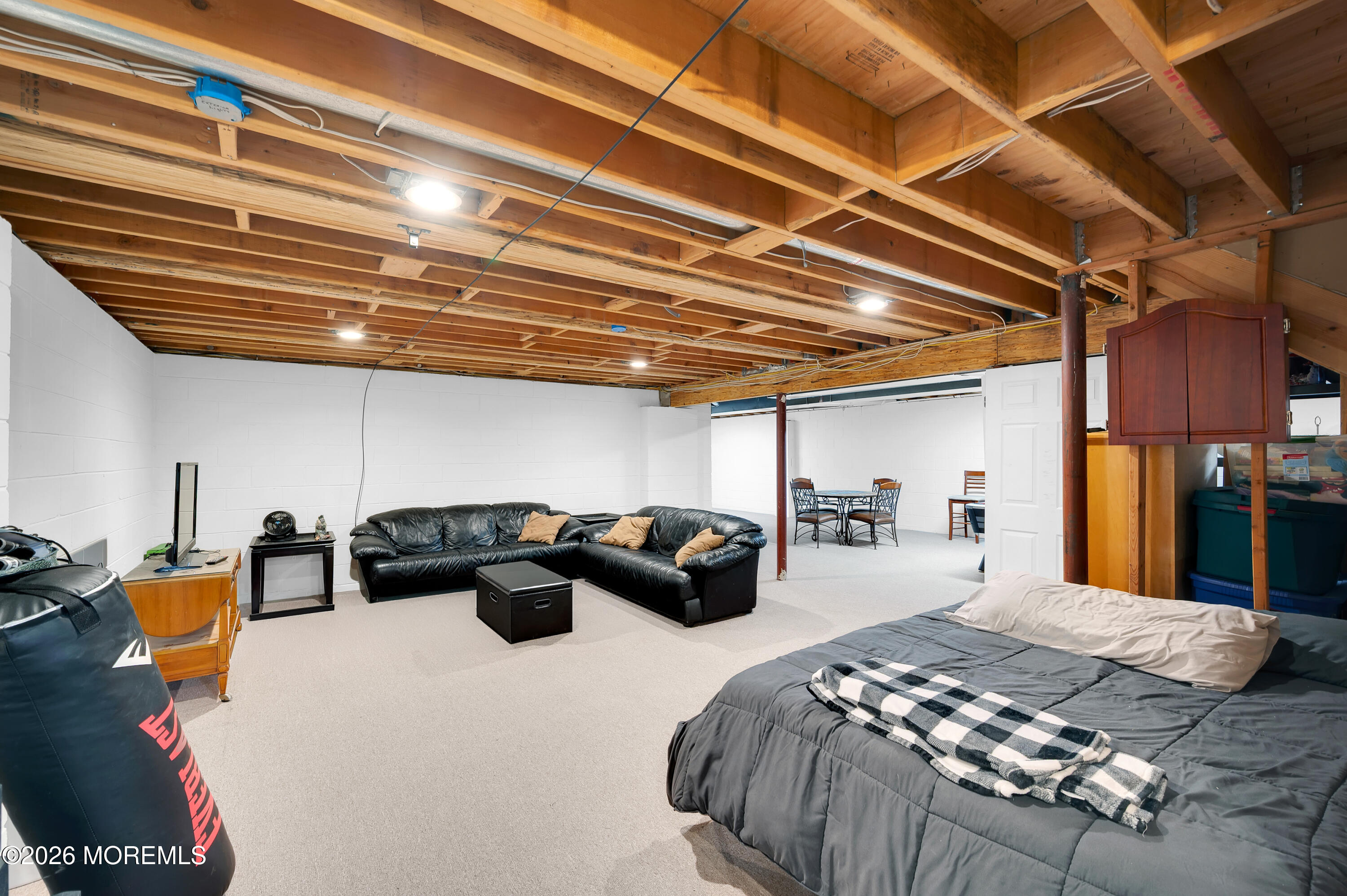 6 Reuben Court Howell, NJ 07731 - Photo 37 of 66 a bedroom with furniture and a bed