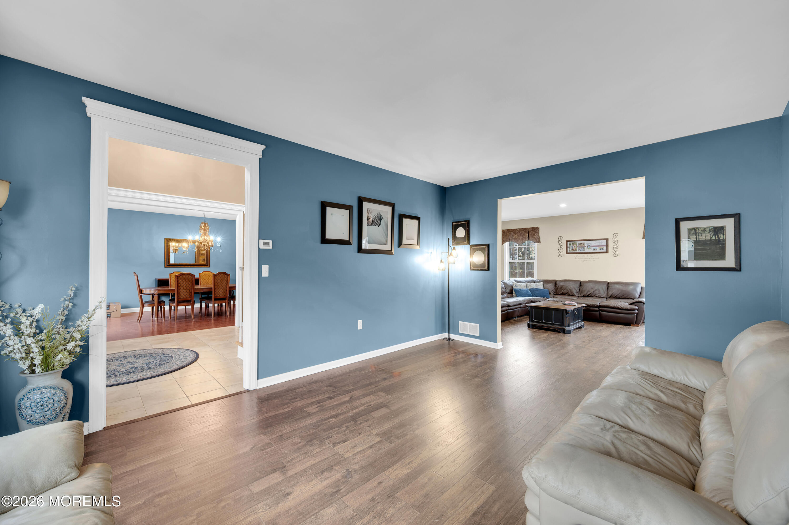 6 Reuben Court Howell, NJ 07731 - Photo 6 of 66 a living room with furniture and a wooden floor