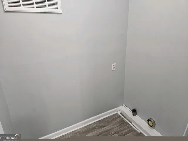 a view of small space with racks on the wall