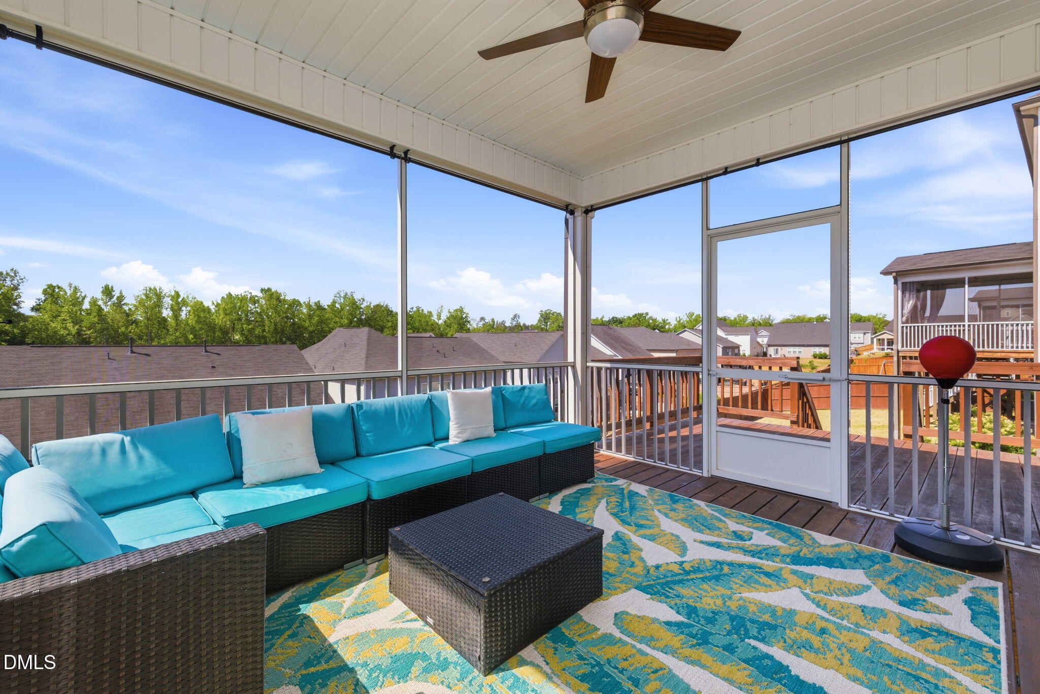3422 Longleaf Estates Drive Raleigh, NC 27616 - Photo 54 of 71 a roof deck with couches chairs and wooden floor