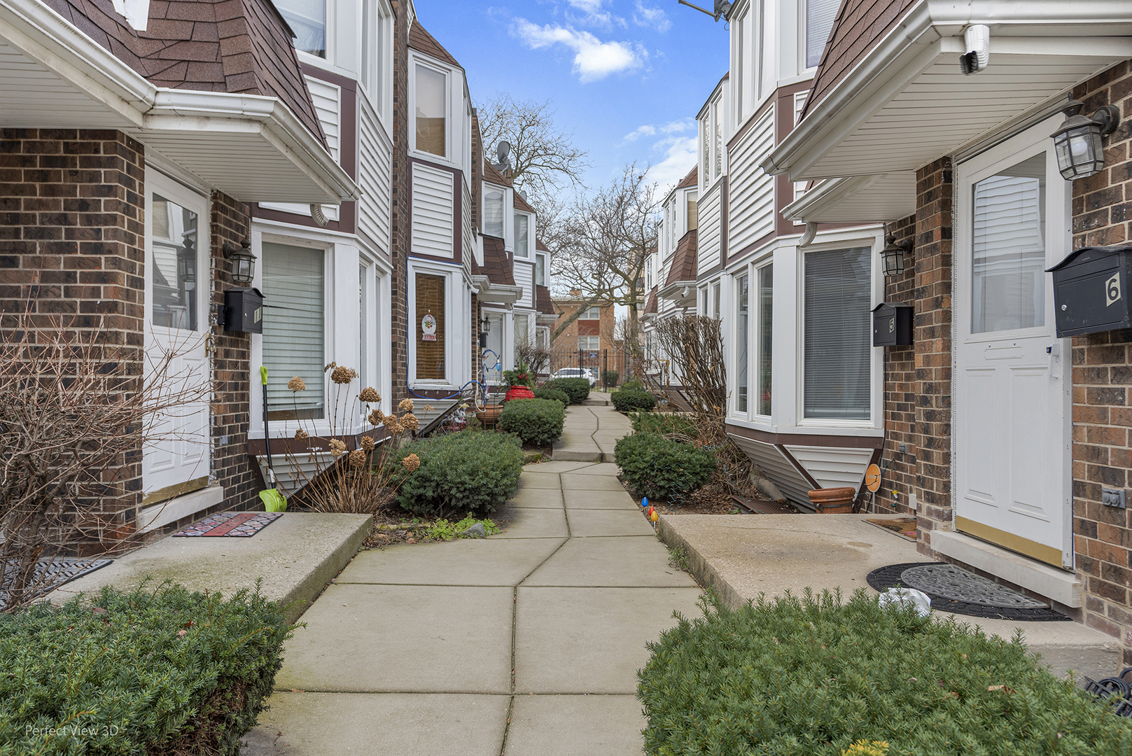 a view of a pathway with a house