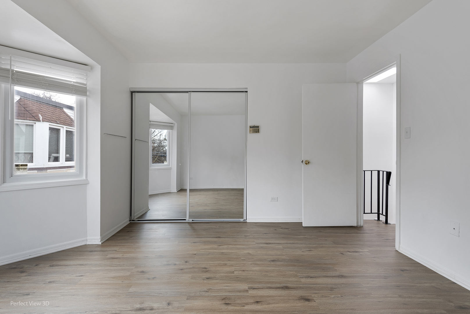 7539 North Ridge Boulevard, Unit 6 Chicago, IL 60645 - Photo 11 of 20 a view of empty room with wooden floor