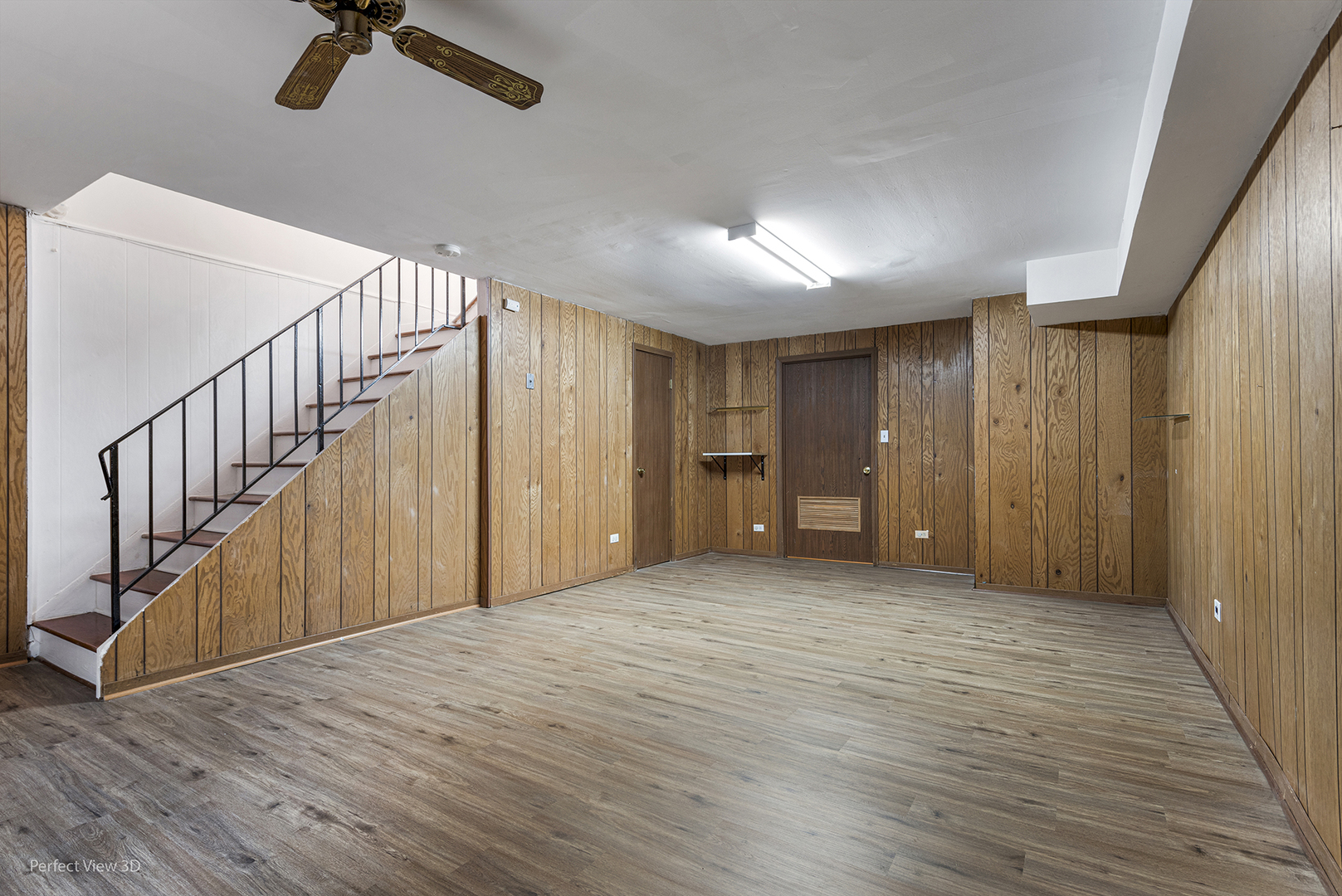 7539 North Ridge Boulevard, Unit 6 Chicago, IL 60645 - Photo 15 of 20 a view of an empty room with stairs and a window