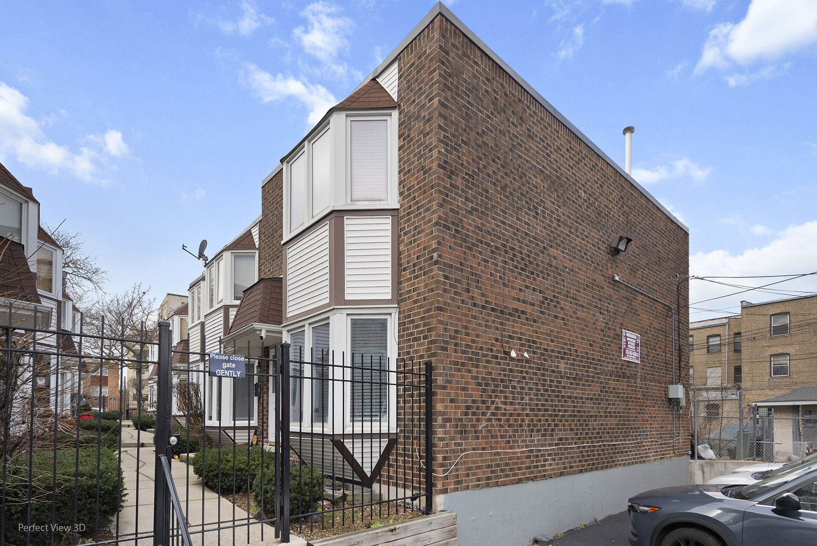 7539 North Ridge Boulevard, Unit 6 Chicago, IL 60645 - Photo 19 of 20 a view of a street with buildings