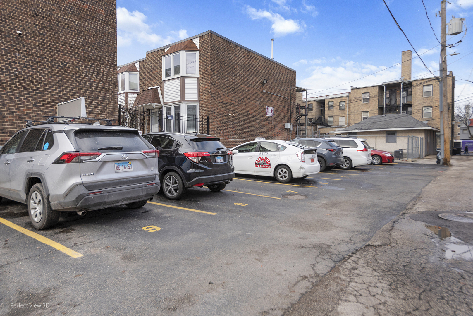 7539 North Ridge Boulevard, Unit 6 Chicago, IL 60645 - Photo 20 of 20 a view of cars parked in front of a building