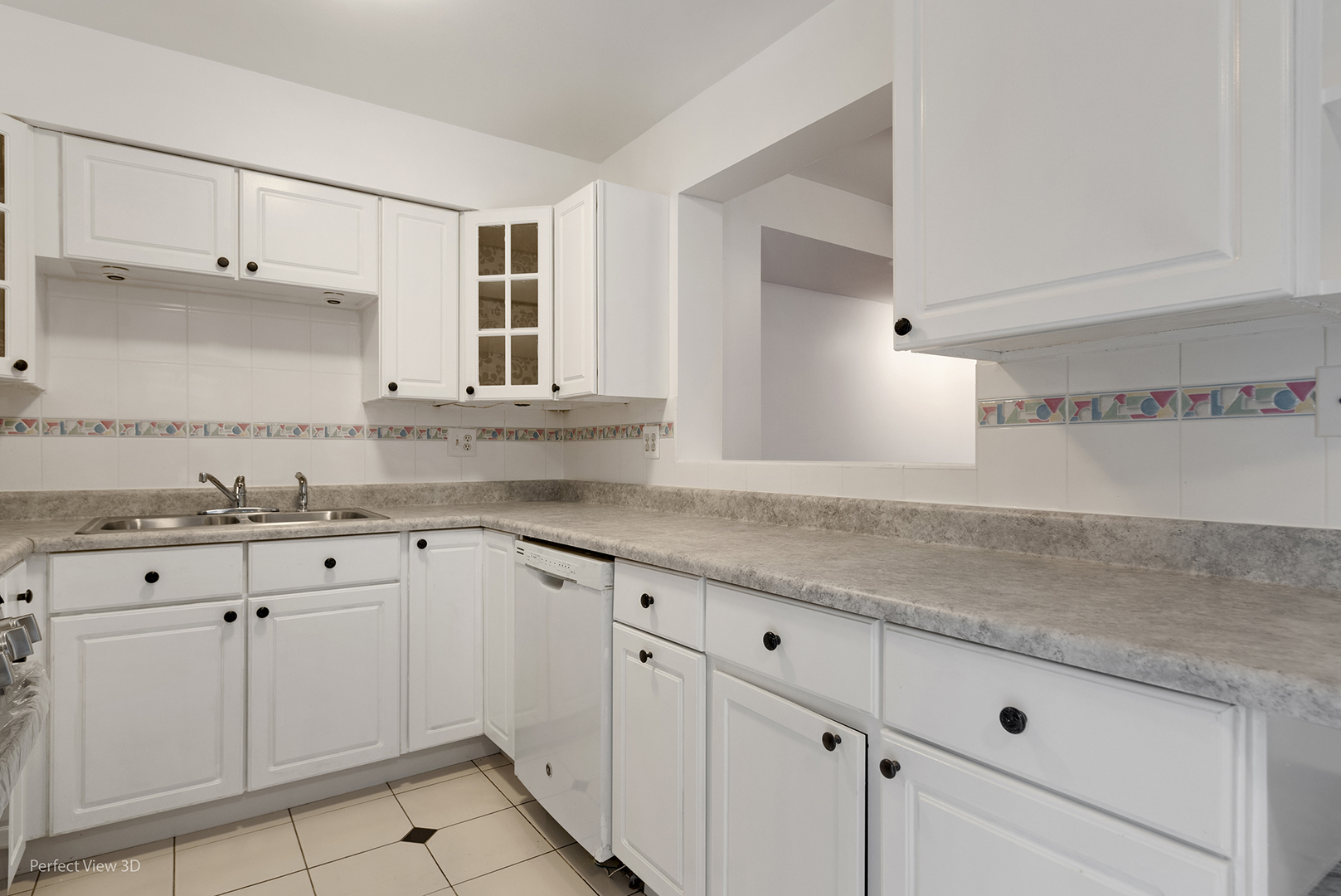 7539 North Ridge Boulevard, Unit 6 Chicago, IL 60645 - Photo 4 of 20 a kitchen with granite countertop white cabinets white appliances and a sink