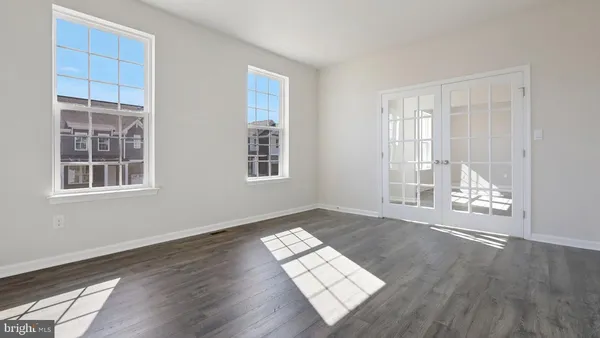 an empty room with windows