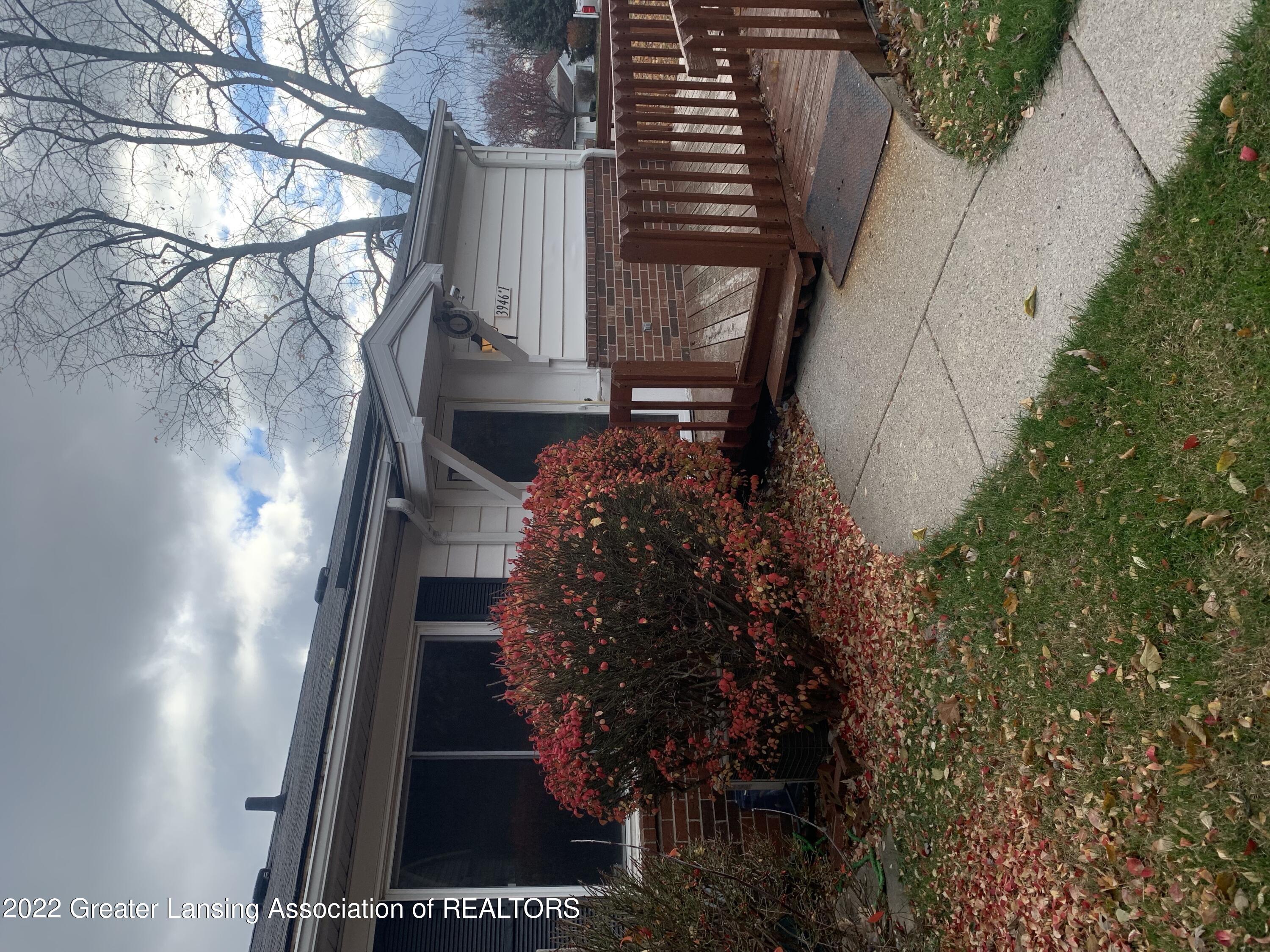 3946 Hunters Ridge Drive, Unit 1 Lansing, MI 48911 - Photo 1 of 12 Front