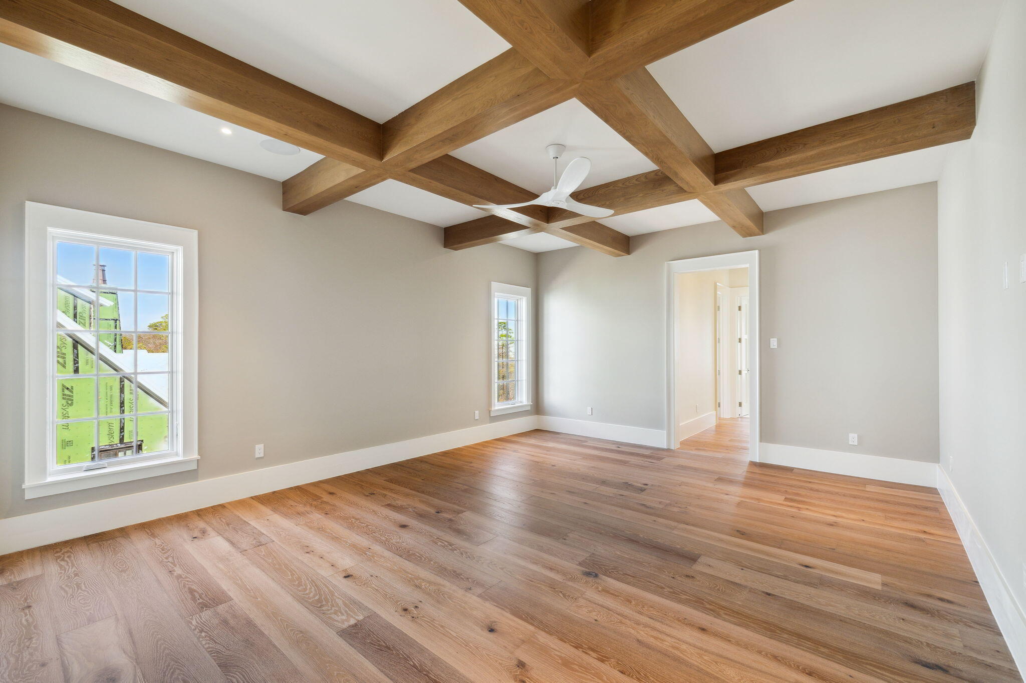 342 Windsong Dr Inlet Beach Inlet Beach, FL 32461 - Photo 60 of 87 a view of an empty room with wooden floor and a window
