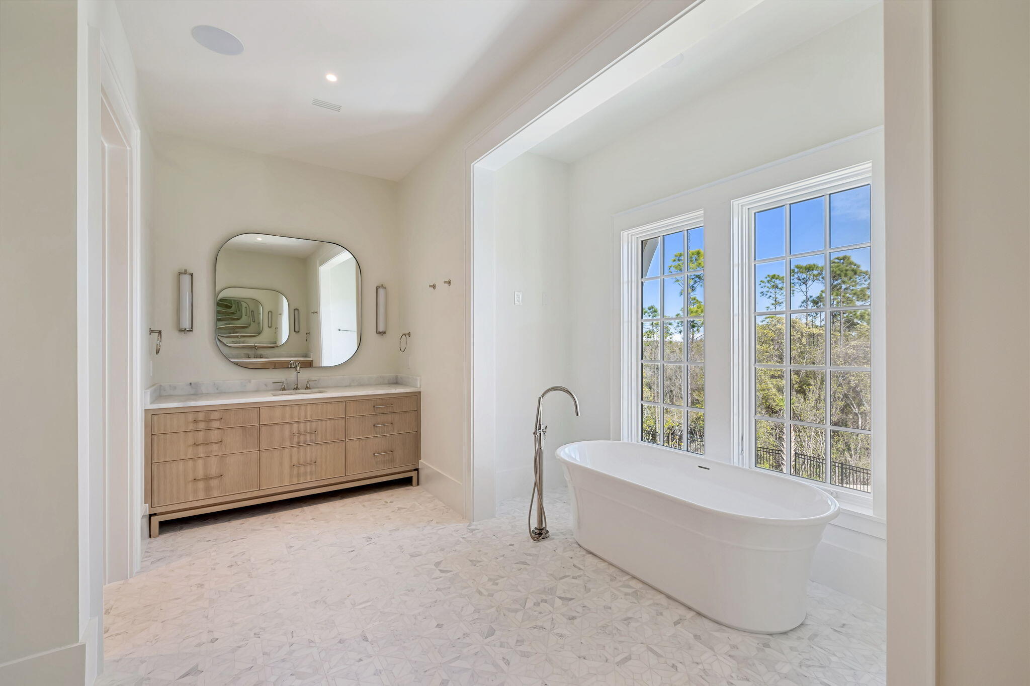 342 Windsong Dr Inlet Beach Inlet Beach, FL 32461 - Photo 64 of 87 a bathroom with bathtub a vanity a window and mirror