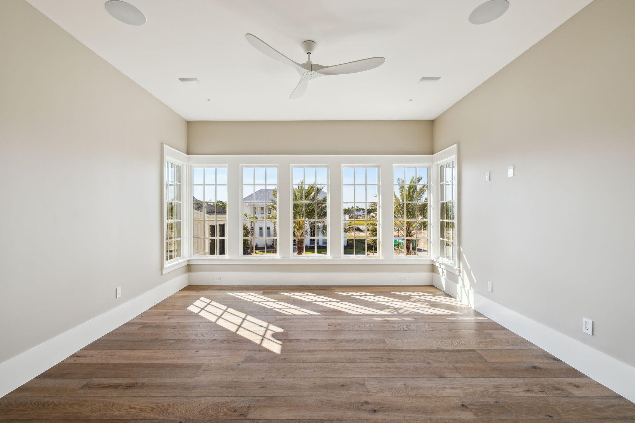 342 Windsong Dr Inlet Beach Inlet Beach, FL 32461 - Photo 66 of 87 a view of an empty room with wooden floor and a window