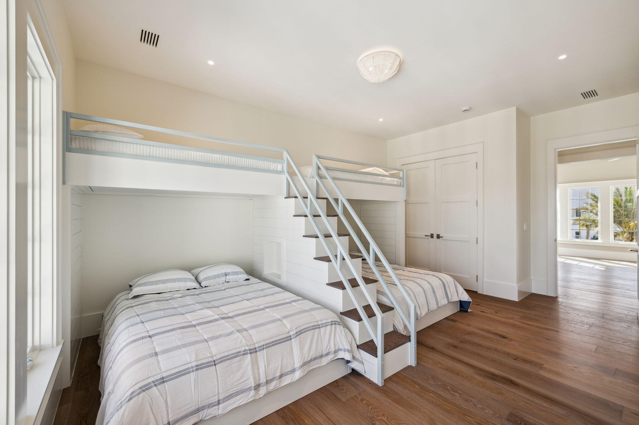 342 Windsong Dr Inlet Beach Inlet Beach, FL 32461 - Photo 70 of 87 a bedroom with a bed and wooden floor