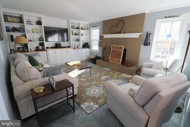 a bathroom with a white shower and a sink