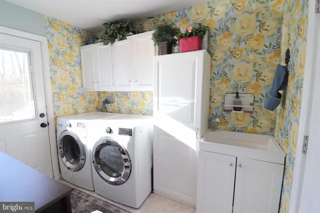 a bedroom with a bed and a table in it