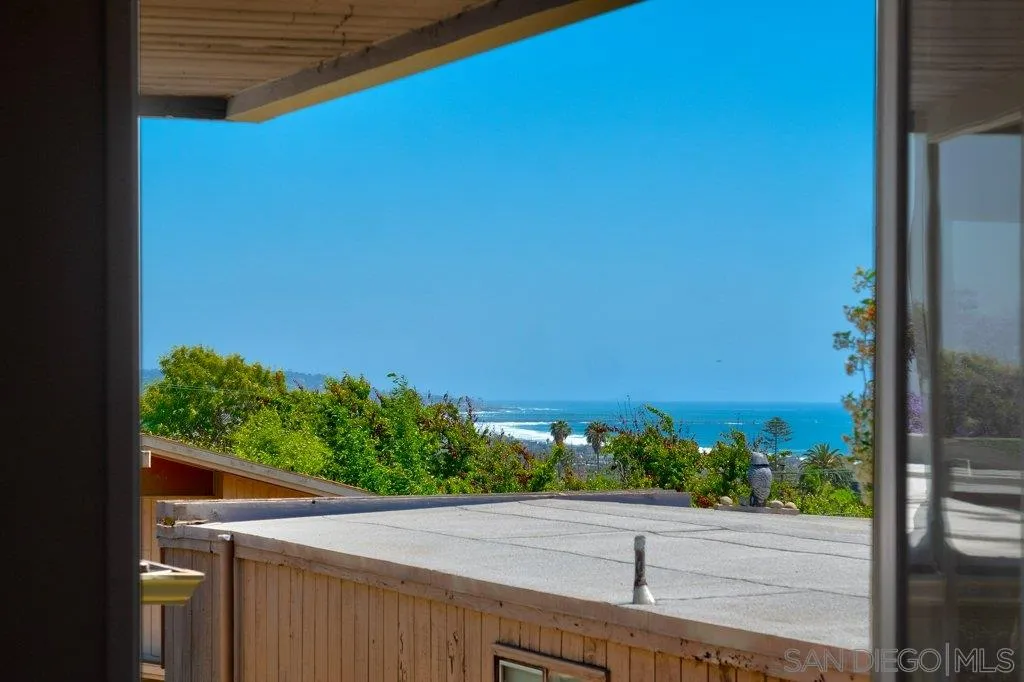 1238 Agate Street San Diego, CA 92109 - Photo 18 of 25 a view of a floor to ceiling window and an outdoor view