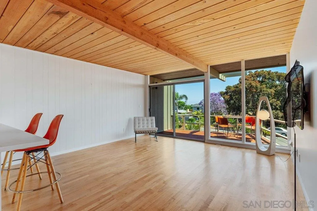 1238 Agate Street San Diego, CA 92109 - Photo 4 of 25 a view of a patio with table and chairs and potted plants