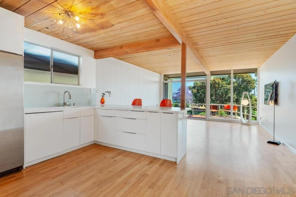 1238 Agate Street San Diego, CA 92109 - Photo 10 of 25 a very nice looking room with a large window