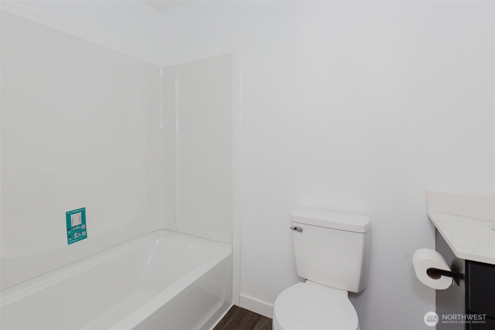 3371 Southeast Bielmeier Road, Unit 78 Port Orchard, WA 98367 - Photo 17 of 27 a bathroom with a toilet and a bathtub