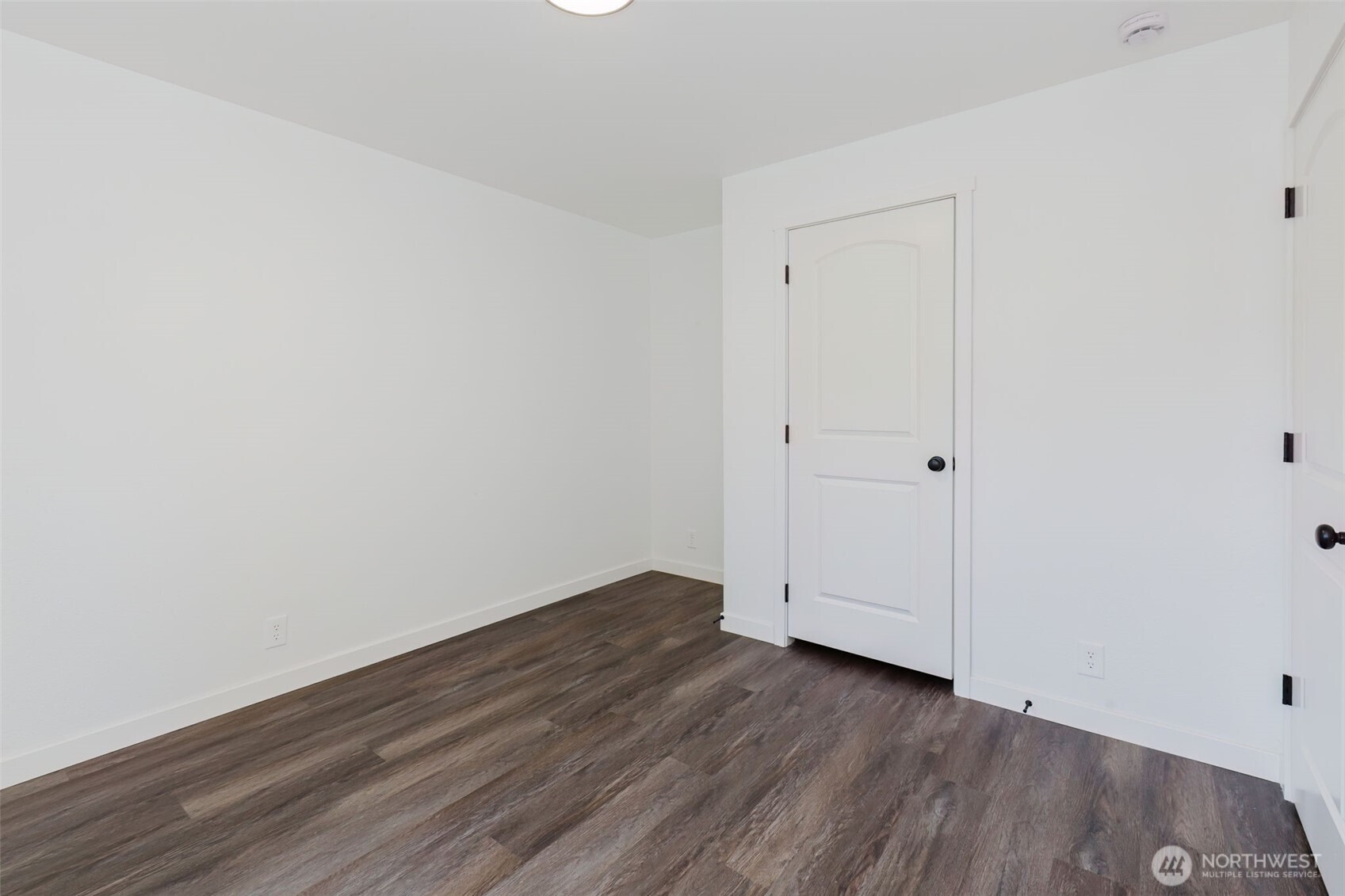 3371 Southeast Bielmeier Road, Unit 78 Port Orchard, WA 98367 - Photo 20 of 27 a view of small space with wooden floor