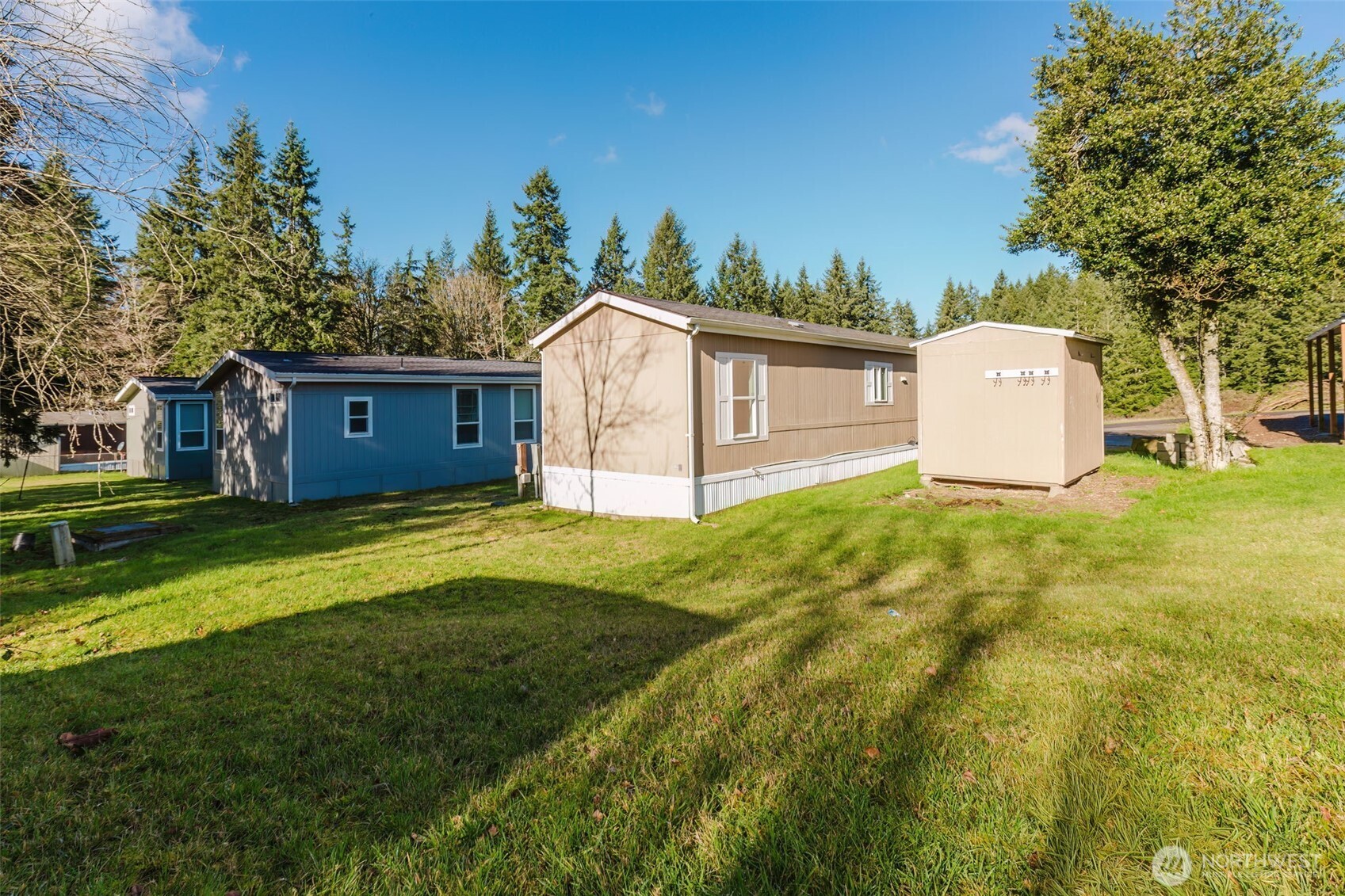3371 Southeast Bielmeier Road, Unit 78 Port Orchard, WA 98367 - Photo 22 of 27 a view of a back yard of the house