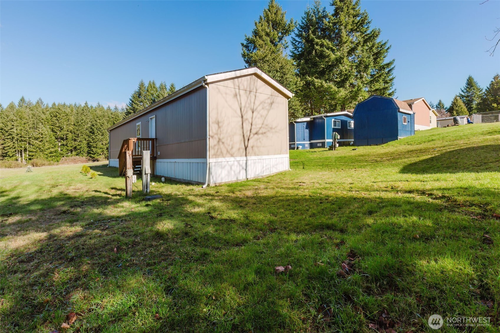 3371 Southeast Bielmeier Road, Unit 78 Port Orchard, WA 98367 - Photo 23 of 27 a house view with a outdoor space