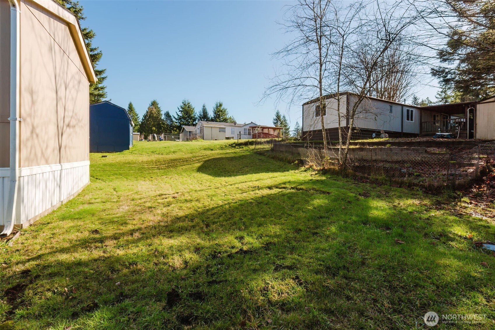 3371 Southeast Bielmeier Road, Unit 78 Port Orchard, WA 98367 - Photo 24 of 27 a house view with swimming pool