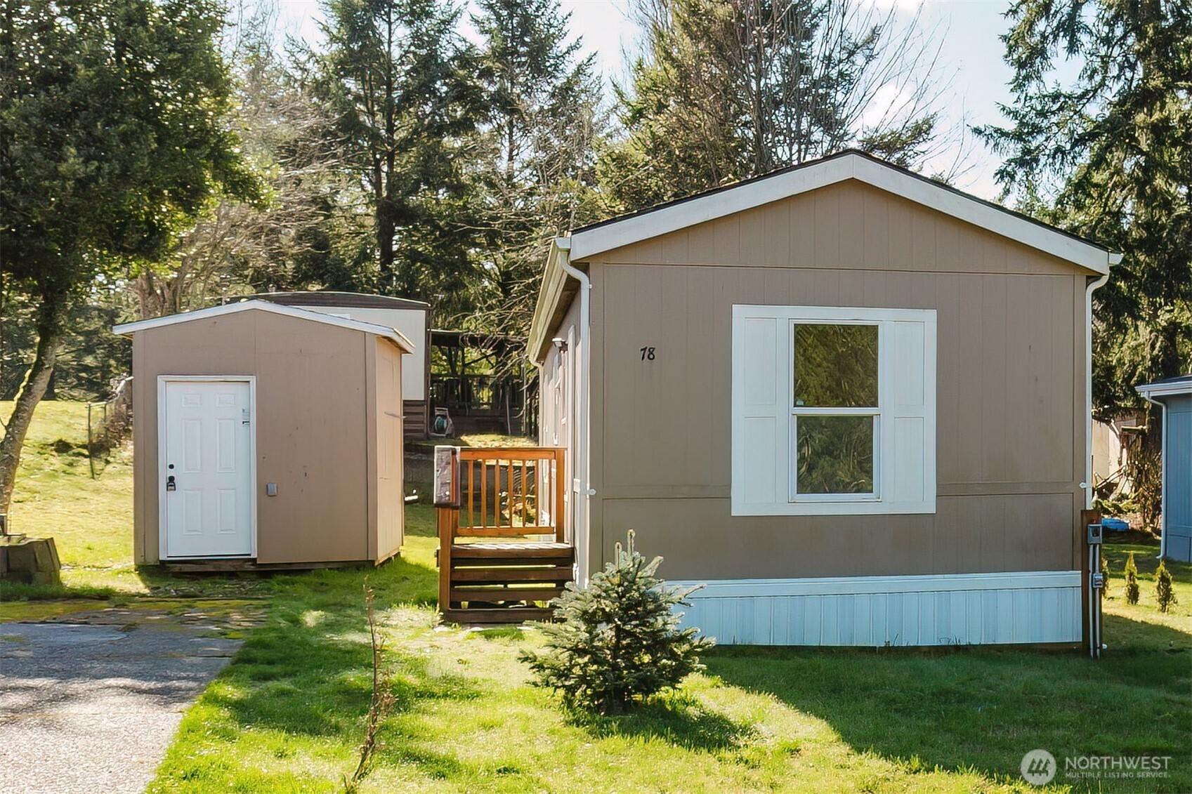 3371 Southeast Bielmeier Road, Unit 78 Port Orchard, WA 98367 - Photo 27 of 27 a house view with a garden space