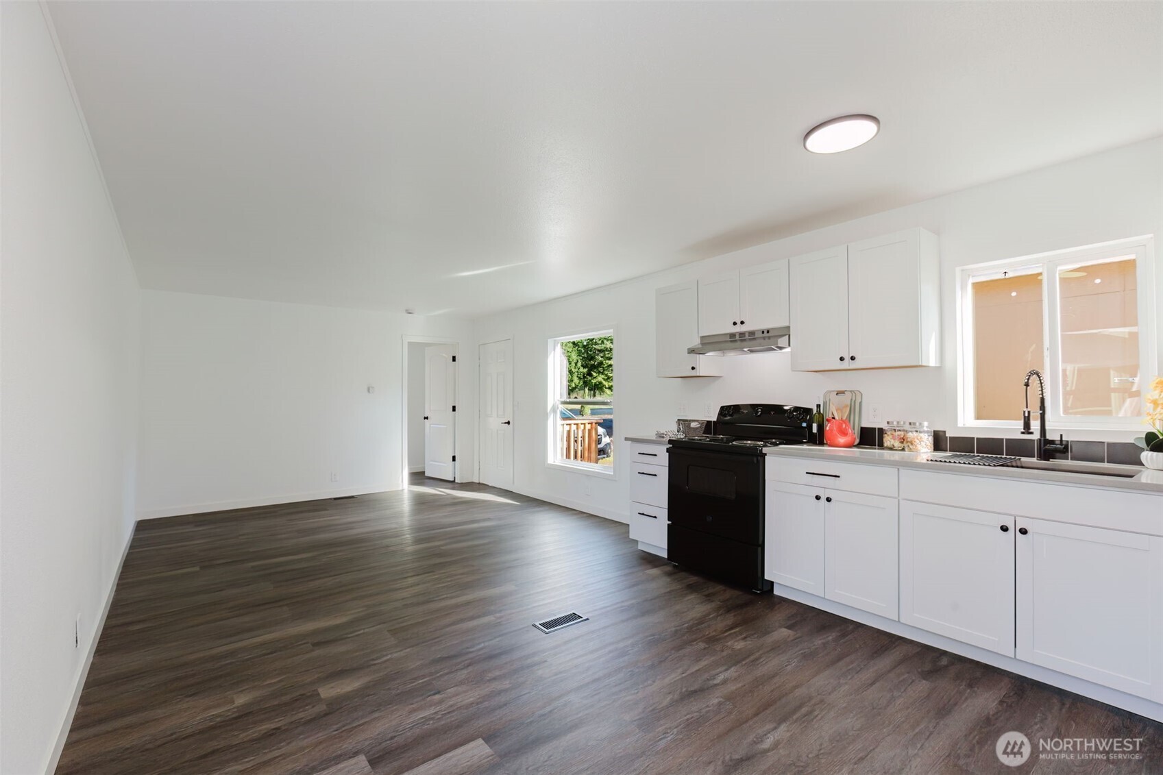 3371 Southeast Bielmeier Road, Unit 78 Port Orchard, WA 98367 - Photo 7 of 27 a kitchen with sink and cabinets