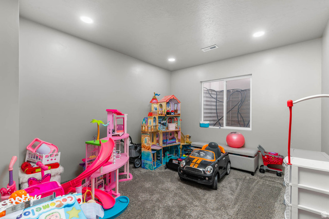 5686 Duke Lane Tooele, UT 84074 - Photo 35 of 38 Playroom with carpet flooring and recessed lighting