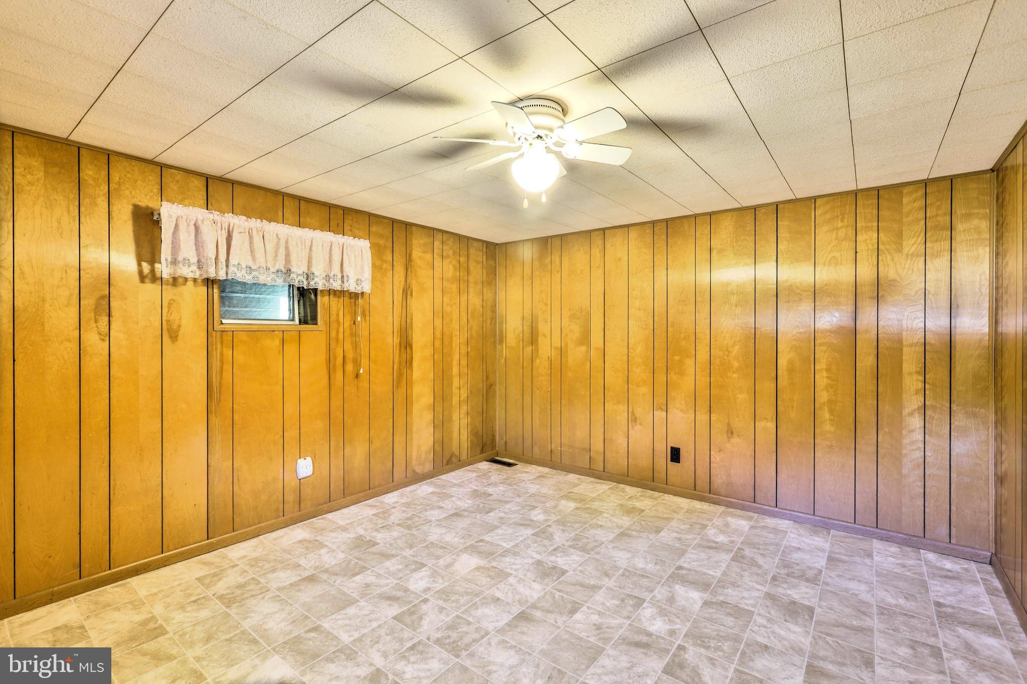 10572 Upper Strasburg Road Upperstrasburg, PA 17265 - Photo 16 of 27 a view of a garage with painted walls