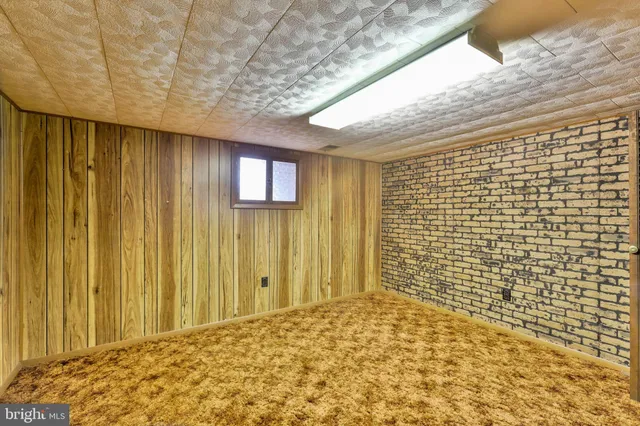 a view of a livingroom with wooden floor