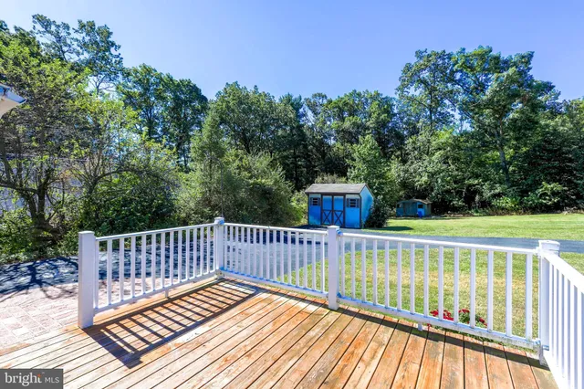 a view of a wooden roof deck