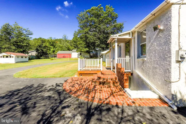 a view of an outdoor space with swimming pool