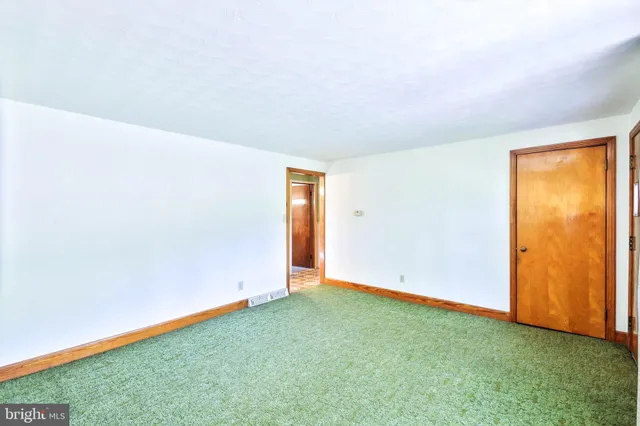 an empty room with closet