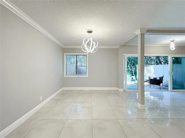 a view of a kitchen with a sink and cabinets