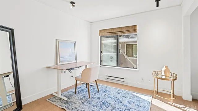 a work room with table and chair