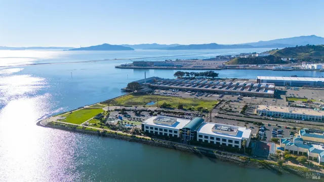a aerial view of a house with a lake view